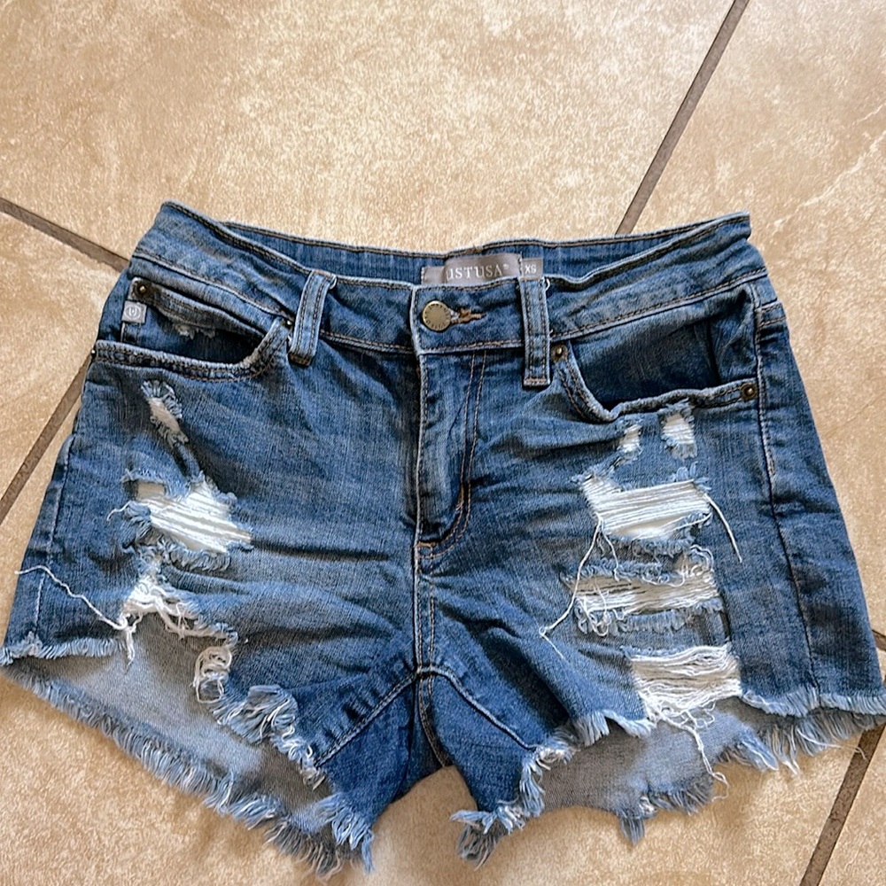 Distressed denim shorts